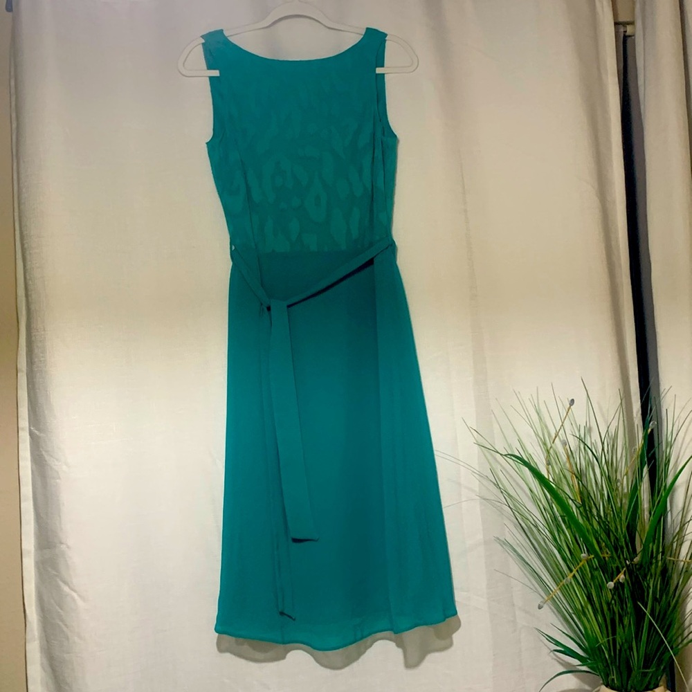 Beautiful green dress from England. Fully lined with sheer overlay.